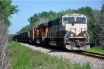 Loaded coal train rolls east